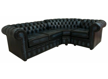 Изысканный кожанный черный угловой диван в стиле честерфилд