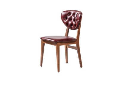 Роскошный стул честерфилд с кожаным сиденьем и спинкой круглой формы в коричневых тонах