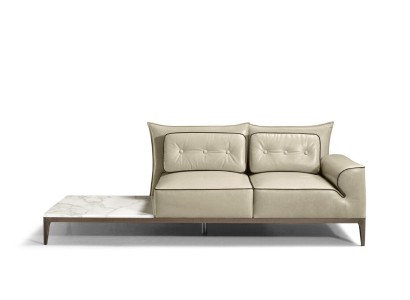 Уникальный кожаный диван со встроенным столиком в современном стиле