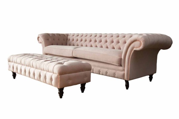 A Luxurious, pink four-seater Chesterfield sofa, INCLUDED seat cushion