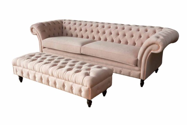 A Luxurious, pink four-seater Chesterfield sofa, INCLUDED seat cushion