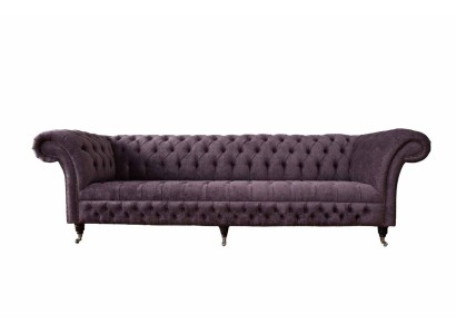 Четырехместный мягкий диван честерфилд в классическом дизайне