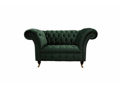 Благородное зеленое кресло честерфилд в роскошной обивке