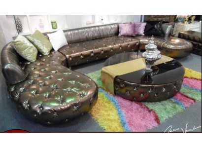Великолепный угловой диван U-формы в кожаной обивке