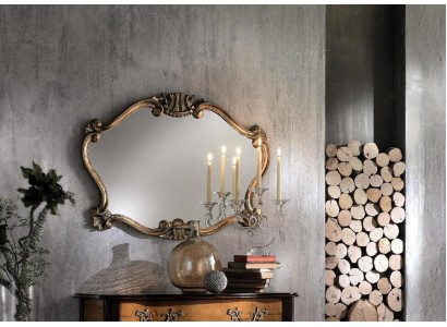 Большое настенное зеркало в классическом итальянском стиле в роскошном бронзовом обрамлении с богатыми декоративными элементами