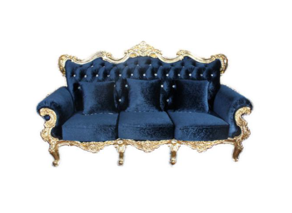 Великолепный диван богатого синего цвета в стиле Честерфилд с потрясающими декоративными элементами в виде узоров 
