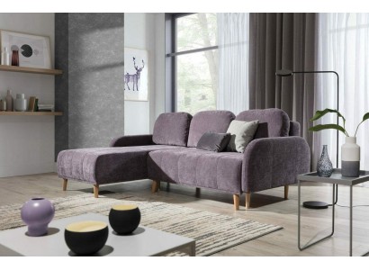 Комфортный угловой диван-кровать в современном функциональном дизайне