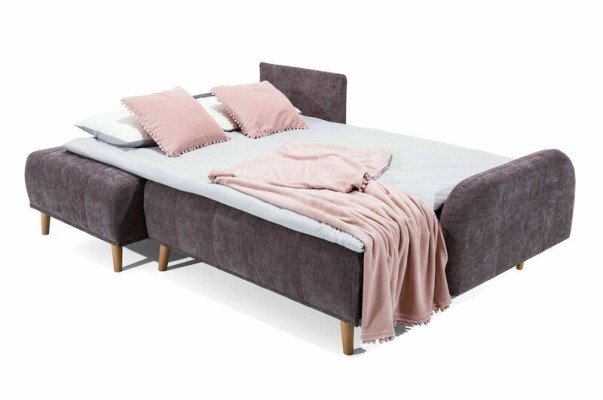 Комфортный угловой диван-кровать в современном функциональном дизайне